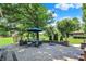 The beautiful backyard patio is perfect for entertaining and relaxing, showcasing the spacious lawn at 5215 Limestone Ct, Indianapolis, IN 46237