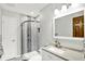 Modern bathroom featuring walk in shower, neutral color palatte and vanity at 5215 Limestone Ct, Indianapolis, IN 46237