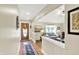 Inviting entryway flows into a cozy living room with lots of natural light at 5215 Limestone Ct, Indianapolis, IN 46237