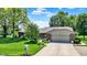 Charming single-story brick home with a well-manicured lawn and beautiful landscaping at 5215 Limestone Ct, Indianapolis, IN 46237