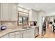 Charming kitchen boasts stainless steel appliances and granite countertops at 5215 Limestone Ct, Indianapolis, IN 46237