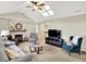 Inviting living room features vaulted ceilings, skylight, and fireplace feature at 5215 Limestone Ct, Indianapolis, IN 46237