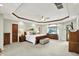 Large main bedroom with tray ceilings and a neutral color palette at 5215 Limestone Ct, Indianapolis, IN 46237