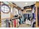 A functional walk-in closet featuring ample storage and organization, including shelving and clothing racks at 5215 Limestone Ct, Indianapolis, IN 46237