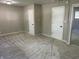 Spacious carpeted bedroom featuring neutral walls and multiple closets providing ample storage at 526 Emerson Rd, Carmel, IN 46032