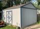 Well-maintained shed with double doors, offering practical storage solutions with stylish design at 526 Emerson Rd, Carmel, IN 46032