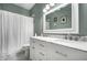 Bathroom features a double vanity, shower-tub and a neutral color scheme at 608 E 9Th St, Indianapolis, IN 46202