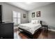Comfortable bedroom with a large window and a cozy atmosphere at 608 E 9Th St, Indianapolis, IN 46202