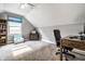Bright home office with natural light, a neutral palette, and a built-in bookshelf at 608 E 9Th St, Indianapolis, IN 46202