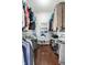 Walk-in closet with shelving, hanging racks and plenty of space at 608 E 9Th St, Indianapolis, IN 46202