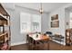 Cozy dining area with natural light, wood table, and stylish decor on a decorative shelf at 622 E 10Th St # 310, Indianapolis, IN 46202