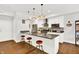 Modern kitchen features a large center island with barstool seating and stainless steel appliances at 622 E 10Th St # 310, Indianapolis, IN 46202