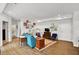 Spacious open-concept living area with modern furnishings, hardwood floors, and abundant natural light at 622 E 10Th St # 310, Indianapolis, IN 46202