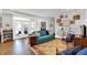 Bright living room boasts natural light, hardwood floors, stylish décor and a walkout patio at 622 E 10Th St # 310, Indianapolis, IN 46202