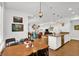 Open-concept space featuring a kitchen island with dining table and cozy living room at 622 E 10Th St # 310, Indianapolis, IN 46202