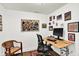 Inviting office space with art-adorned walls, adjustable desk, and stylish ergonomic chair at 622 E 10Th St # 310, Indianapolis, IN 46202