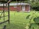 Lush backyard with a charming pergola, ideal for outdoor relaxation at 6237 E Lynn Dr, Mooresville, IN 46158