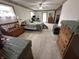 Spacious carpeted bedroom with a ceiling fan and natural light from two windows at 6237 E Lynn Dr, Mooresville, IN 46158
