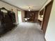 View of dining room area with brick accent wall at 6237 E Lynn Dr, Mooresville, IN 46158