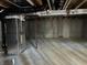 Unfinished basement with concrete floor and walls featuring exposed ductwork at 637 Firefly Ct, Greenfield, IN 46140