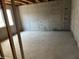 Unfinished basement featuring concrete walls, a window, and a concrete floor at 637 Firefly Ct, Greenfield, IN 46140