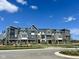 New townhome exteriors with varied colors offer an attractive design at 7313 Bayview Run, McCordsville, IN 46055