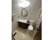 Cozy bathroom with a stylish vanity and updated fixtures at 7607 Ardwell Ct, Indianapolis, IN 46237