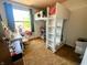 Bedroom area with a desk and workspace, enhanced by natural light at 7607 Ardwell Ct, Indianapolis, IN 46237