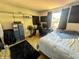 Bedroom area with a desk and workspace, enhanced by natural light at 7607 Ardwell Ct, Indianapolis, IN 46237