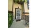 Welcoming front entry with secure storm door, brick accents, and a covered porch area at 7607 Ardwell Ct, Indianapolis, IN 46237