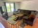Spacious living room with a comfortable sectional sofa and a large window with natural light at 7607 Ardwell Ct, Indianapolis, IN 46237