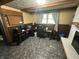 Office features two desks, ergonomic chair, and a window for natural light at 7607 Ardwell Ct, Indianapolis, IN 46237