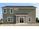 View of the home's back exterior featuring siding, a patio, and sliding glass doors for easy access at 764 Parker Ln, Westfield, IN 46074