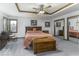 Well-lit main bedroom with trey ceiling, large closet, and furnishings at 7741 Long Branch Dr, Indianapolis, IN 46259