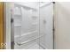 Clean white shower features glass enclosure and storage shelves at 7741 Long Branch Dr, Indianapolis, IN 46259
