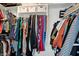 Organized walk-in closet featuring ample hanging space and shelving for clothing and accessories at 8030 Parcrest Ct, Indianapolis, IN 46259