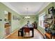 Traditional dining room with modern table and shelving at 8030 Parcrest Ct, Indianapolis, IN 46259