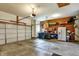 Spacious two-car garage with ample storage space, work bench, and well-organized storage at 8030 Parcrest Ct, Indianapolis, IN 46259