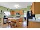 Bright kitchen with stainless appliances, a center island and breakfast bar at 8030 Parcrest Ct, Indianapolis, IN 46259