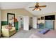 Spacious main bedroom with views to ensuite bathroom and sitting area at 8030 Parcrest Ct, Indianapolis, IN 46259