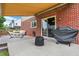 Relaxing patio area with a grill, and a comfortable seating area, perfect for outdoor entertaining at 8030 Parcrest Ct, Indianapolis, IN 46259