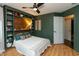 Bedroom with built in shelving around a wooden headboard at 8140 Springwater W Dr, Indianapolis, IN 46256