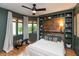 Bedroom featuring green built-ins, window seating, and natural light at 8140 Springwater W Dr, Indianapolis, IN 46256
