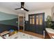 Bedroom with hardwood floors, large closet, and charming decor at 8140 Springwater W Dr, Indianapolis, IN 46256