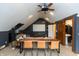 Bonus room featuring large projector screen for movies and entertaining at 8140 Springwater W Dr, Indianapolis, IN 46256