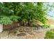 Backyard fire pit area providing an inviting space for outdoor gatherings and relaxation at 8140 Springwater W Dr, Indianapolis, IN 46256