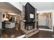 Close up of stylish fireplace featuring brick and modern design at 8140 Springwater W Dr, Indianapolis, IN 46256