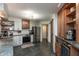 Open kitchen design with stainless appliances, lots of cabinet space and stone tile flooring at 8140 Springwater W Dr, Indianapolis, IN 46256