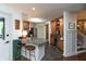Spacious kitchen with bar area, providing open access to other rooms of the house at 8140 Springwater W Dr, Indianapolis, IN 46256