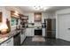 Modern kitchen featuring granite countertops, stainless steel appliances, and ample cabinet space at 8140 Springwater W Dr, Indianapolis, IN 46256